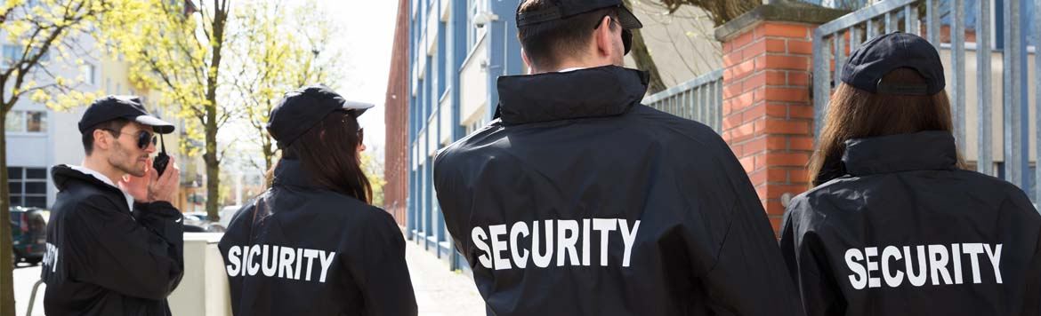 Image of the four Security guards screening, Armstrong Guard Services